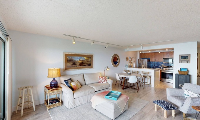 Maple City Condo | Single-level lakefront hideaway with a deck, fireplace, & washer/dryer