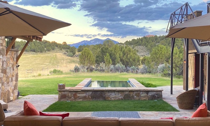 Missouri Heights House | Sky Door Ranch: 35 acres, 8,278 square feet, small infinity pool, and views!