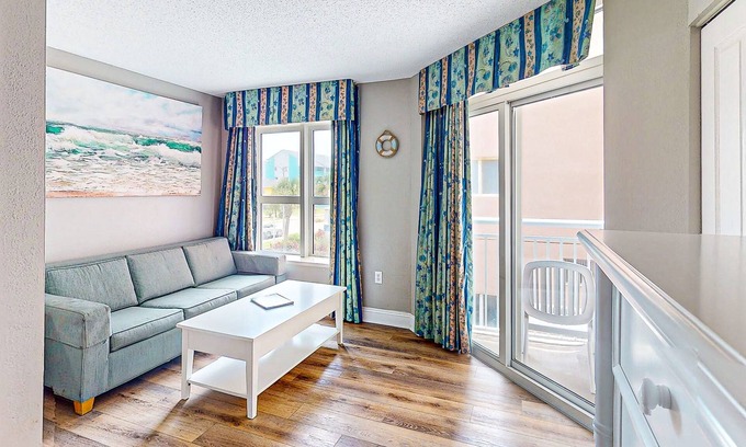Crescent Beach Apartment | Snowbird-friendly studio with central AC, balcony, hot tub, pool & beach access