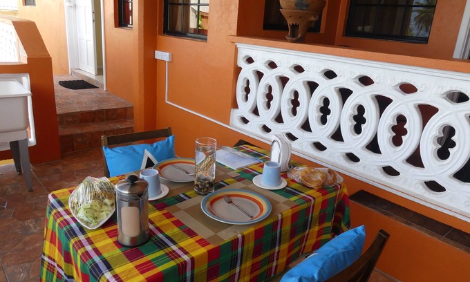 Laborie Apartment | Southern Comfort at its best! Family suite overlooking quaint village street.