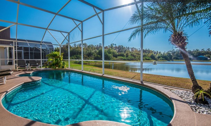 Eagle Pointe South House | SOUTHFACING Private Pool, Lakeview,4 BR-2 Bath,Ultra Clean Modern,10 min Disney