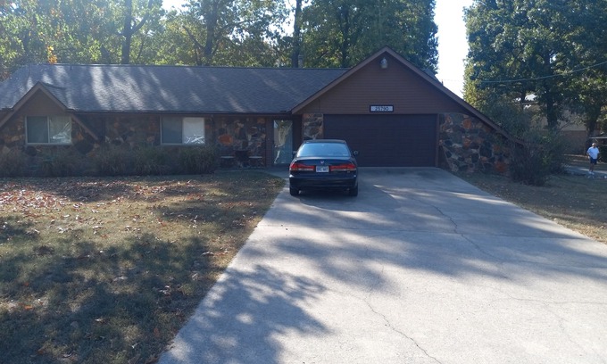 Grove House | Spacious 3 bedroom 2 bath home with large fenced in yard.