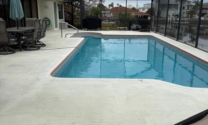 Spring Hill House | Spacious 4BR Waterfront Home w/Heated Pool, Dock & Gulf Access, Sleeps 14+