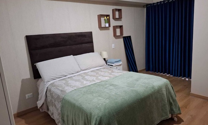 Santa Beatriz Apartment | Spacious, close to parque de las aguas and national stadium, with garage.