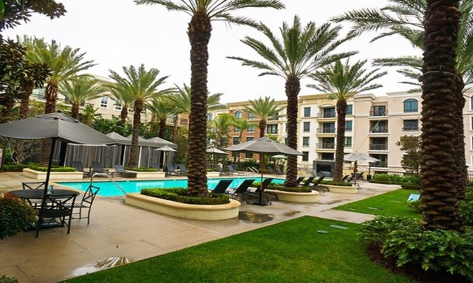 Downtown Apartment | Spacious corner suite with patio +private balcony with direct pool access!