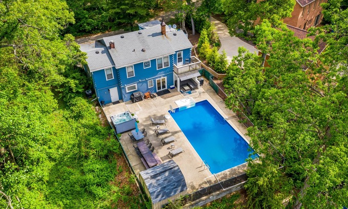 Grand Beach House | Spacious, dog-friendly home with a gas fireplace, pool, hot tub, & golf carts