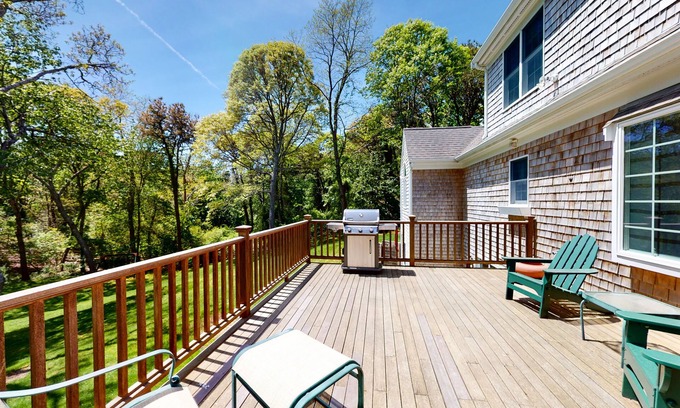 East Orleans House | Spacious home with huge deck & tree-lined yard, grill, & WiFi - great location