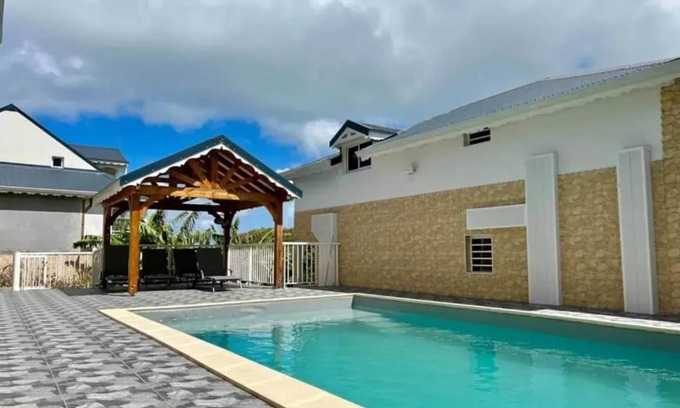 Bas Vent House | Spacious House in Deshaies with Shared Pool