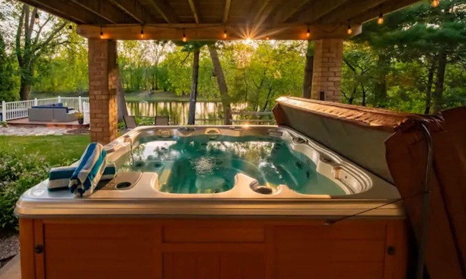 Fridley House | Spacious Mississippi River Retreat-Hot Tub, Massage Chair & Room for 16