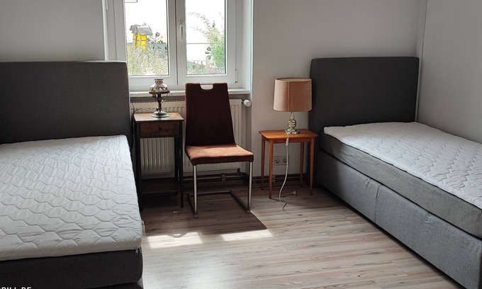Veitshoechheim Apartment | Spacious modern apartment & barbecue parking spaces
