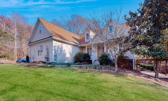 Huddleston House | Spacious retreat with golf course views, garden, deck, & pool