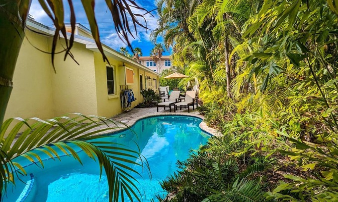 Holmes Beach House | Starfish Cottage: 1 Block to the Beach! Heated Pool, 4 King Beds by Anna Maria Life Vacation Rentals