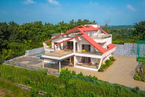 Neral Villa | StayVista's Amorist Villa - Amidst Greenery with Terrace, Kids Zone, Snooker Table, Turf