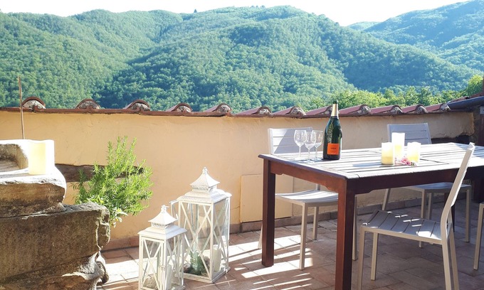 Boveglio Apartment | Stone Rustico with garden in an ancient village in Tuscany. View on ancient Pieve