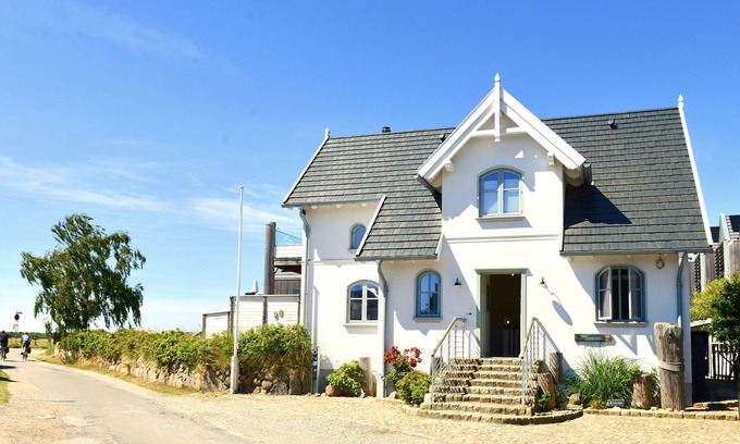 Fehmarnsund Condo | Strandhaus-fehmarn, Captains-deck, Strandlage und Meerblick, Terrasse und Garten