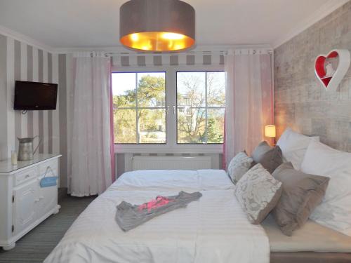 Juliusruh Apartment | Strandhotel Villa Louisa & Appartementhäuser Villa Josephine und Villa Christine