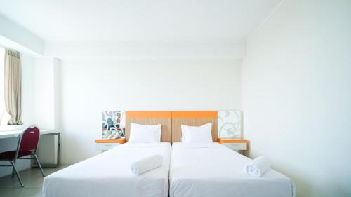 Siwalankerto Apartment | Strategic Studio Apartment at High Point Serviced By Travelio