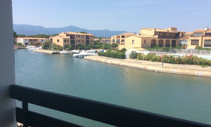 Saint-Cyprien Plage Apartment | Studio air-conditioned cabin 100 m from the beach, with lagoon view, swimming pool