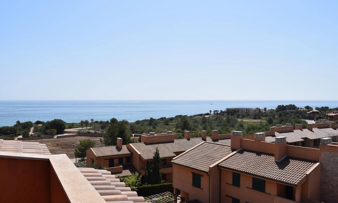 L Almadrava Apartment | Stunning 3-Bedroom Duplex with Pool, Terrace & Parking Near Pristine Beaches