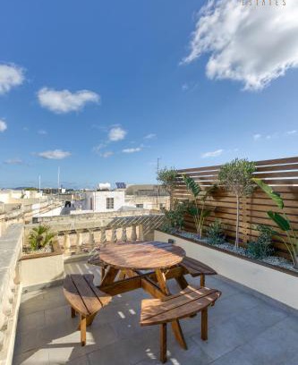 Paola Apartment | Stunning 3BR Townhouse with Private Rooftop Access by 360 Estates