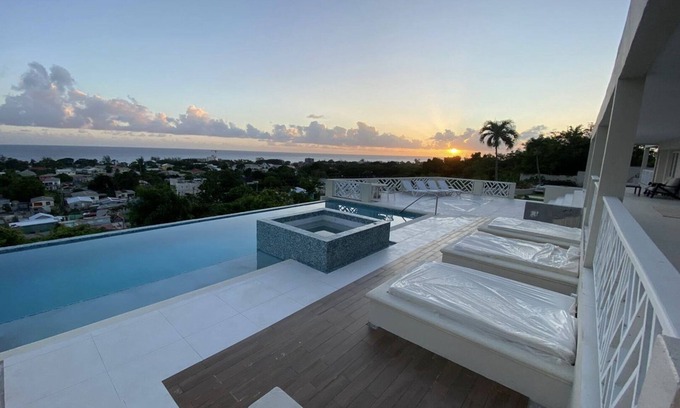 Bridgetown House | Stunning 4 bed luxury villa with infinity pool, jacuzzi & panoramic sea views