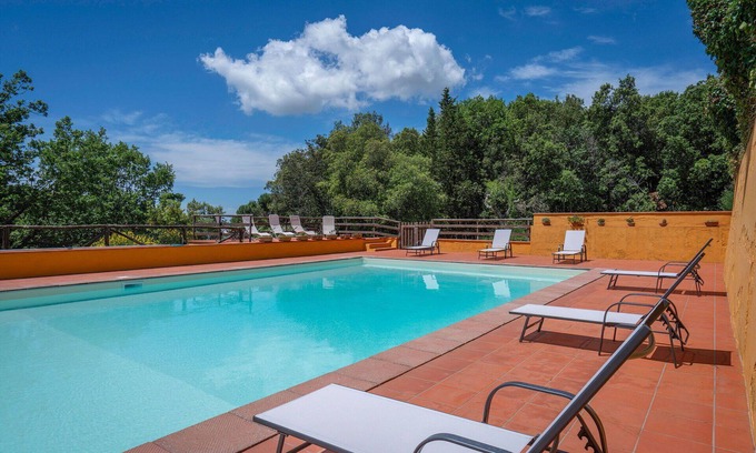 Chianni Villa | Stunning private villa for 12 people with WIFI, private pool, TV, patio and pets allowed