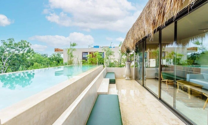 Zama Condo | Stunning Tulum Condo: Rooftop Pool & Modern Design