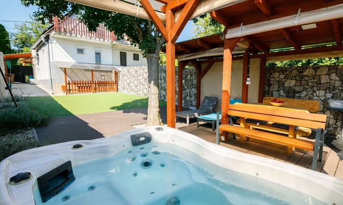 Siofok-Sosto House | Stunning villa for 4 people with WIFI, A/C, hot tub, TV, balcony, pets allowed and parking