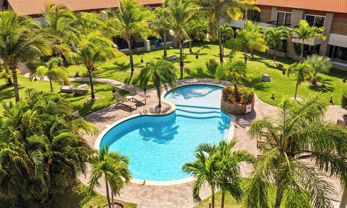 Oranjestad-West Condo | Stylish 3BR Condo, 1 Min to Eagle Beach, Pool, Gym, BBQ & Mini Market 1 Min Away