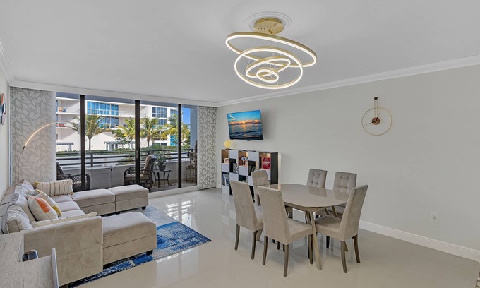 Hallandale Beach Apartment | Stylish Beachfront Gem ~ Sea View, Pool, Gym, Pkg!