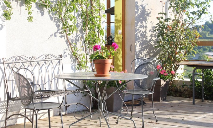 Saint-Didier-sur-Arroux House | Stylish living in the village square with a large terrace overlooking the Morvan