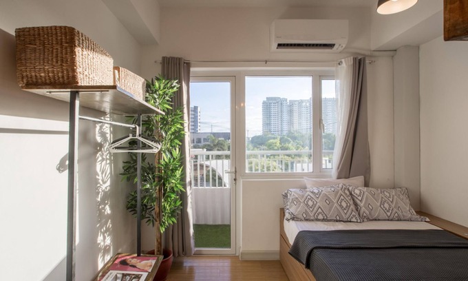Ususan Condo | Stylish Home Near Airport and Cities