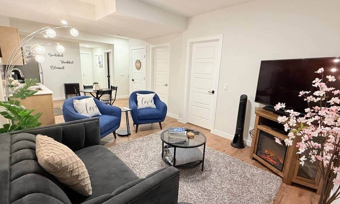 Southwest Calgary House | Stylish suite, family & work friendly, near mountains/parks, free WiFi+parking