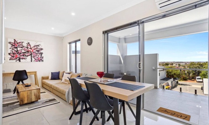 Woodlands Apartment | Stylish urban oasis with balcony & street views!
