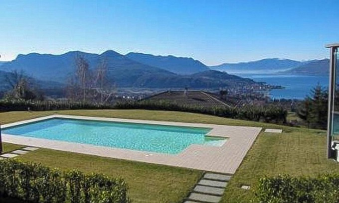 Poppino Apartment | Stylishly furnished vacation apartment in a residence with pool & dream lake view