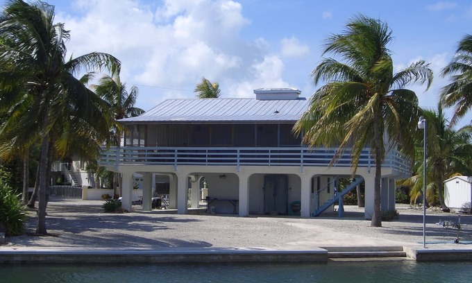 Sugarloaf Shores House | Sugarloaf Shores Wide Canal 3/3 Waterfront w/100 ft Seawall in Quite Community.