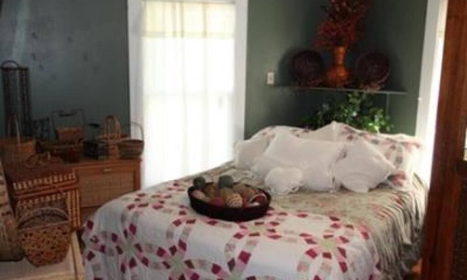 San Angelo Bed & Breakfast | Suite, Courtyard view at Music Garden Mansion