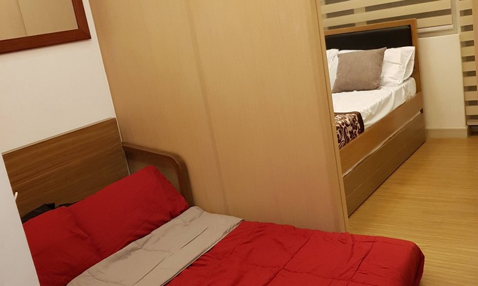 Ususan Condo | Suite Pool View with Balcony