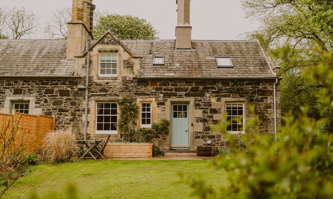 Stranraer Cottage | Sumptuous Romance: Tip-top luxe lodge & garden on vast seaside estate