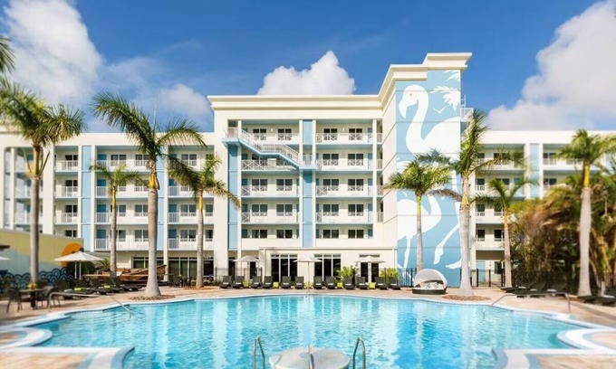New Town Hotel | Sun, Sip, & Socialize | Island Stay w/2 Pools & Backyard Bash
