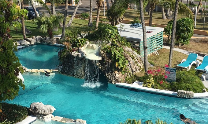 Paradise Island Condo | Sunrise Beach Villas Deluxe One Bedroom Apartment located on Beachfront Resort