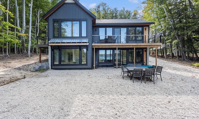 Kewadin House | 🏘️ Sunrise Sands Retreat: Beach & Dock on Torch Lake