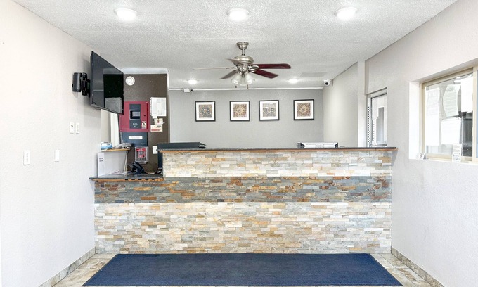 Iowa River Landing Hotel | Super 7 Motel