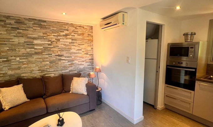 Santa Giulia Apartment | Superb ground garden villa, close to beaches, santa giulia, WiFi, air conditioning