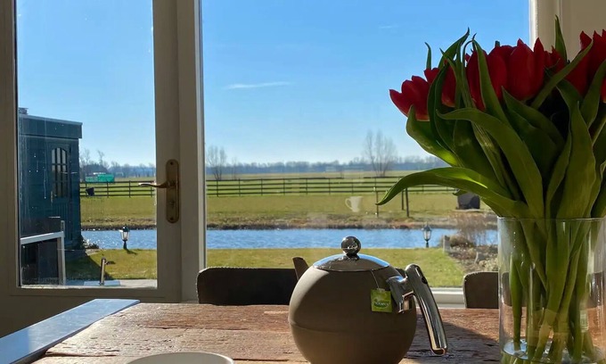 Berkhout House | Sweet little home on the water with a fireplace