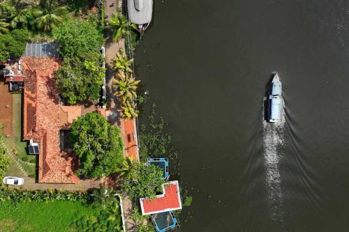 Mankombu Villa | The Backwater Heritage- Comp Breakfast with River View, Ocean Breeze & Lawn by StayVista -