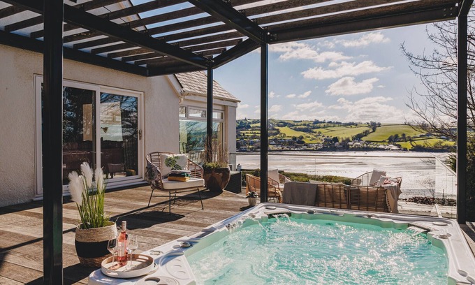 Teignmouth Ski Chalet | The Curlews - Waterside, boutique home with 10 person spa