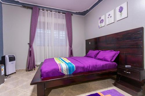 Soroti Apartment | The Den Soroti Purple