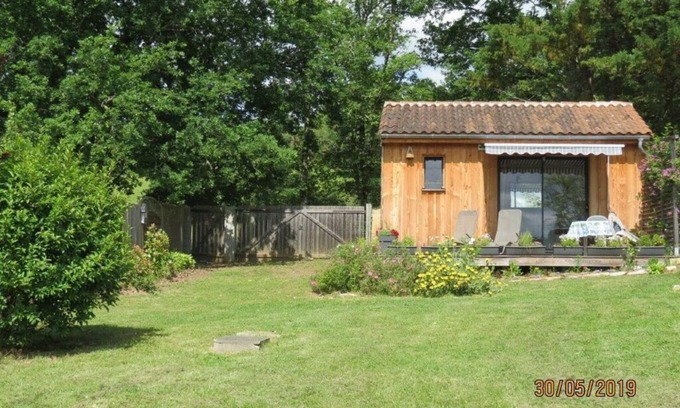 Saint-Leon-sur-Vezere Ski Chalet | The Ensoleillade Ecological small wooden chalet of 19m2 in garden with view.