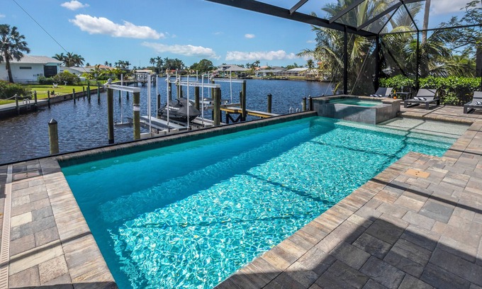 Yacht Club Villa | THE GREAT LAKE - Luxury Waterfront, Pool, Spa, Boating Gulf Access , Sleeps 10